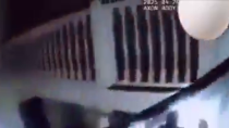 Thumbnail for Female cop shoots own reflection in mirror 