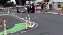 Thumbnail for Muslim ladies leave a car at the train crossing in New Zealand 