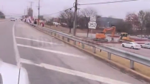 Thumbnail for Diesel truck rolling coal while driving by a Tesla protestors.