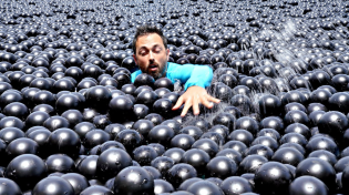 Thumbnail for Can You Swim in Shade Balls? | Veritasium
